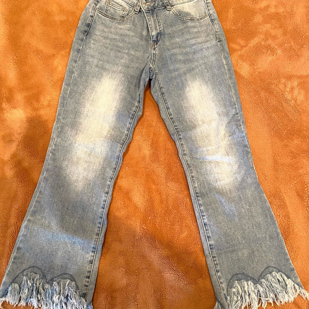 Frayed flare jeans
